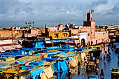 Marrakech - Jemaa el-Fna. Al mattino la piazza  poco pi di un mercato all'aperto.